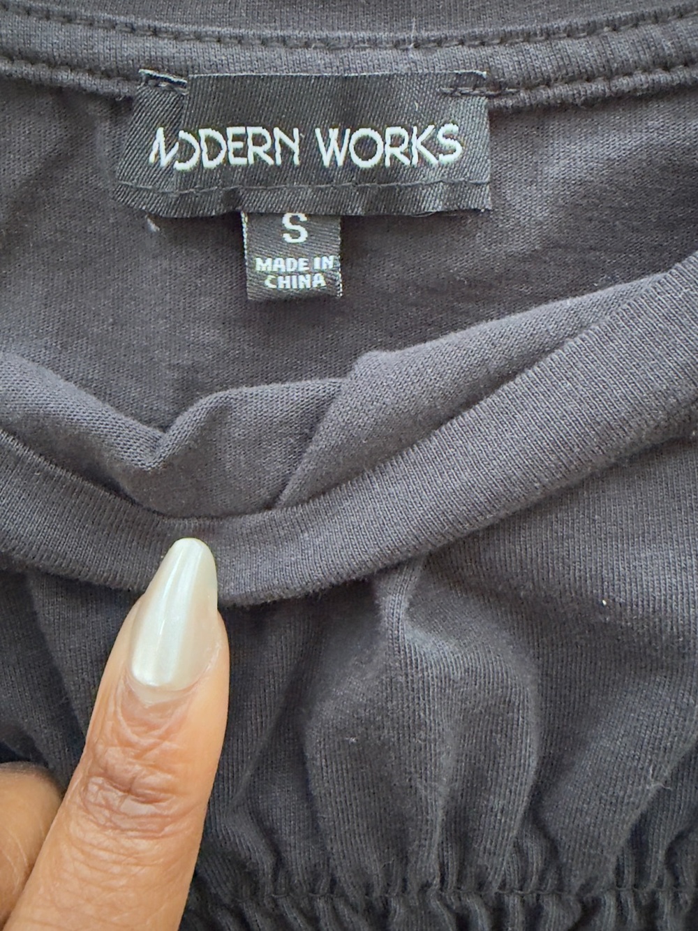 Black Smocked T-Shirt, featuring a fitted smocked bodice and a playful hem - Picture 4 of 5